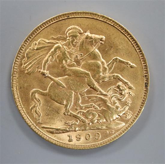 A 1909 gold full sovereign.